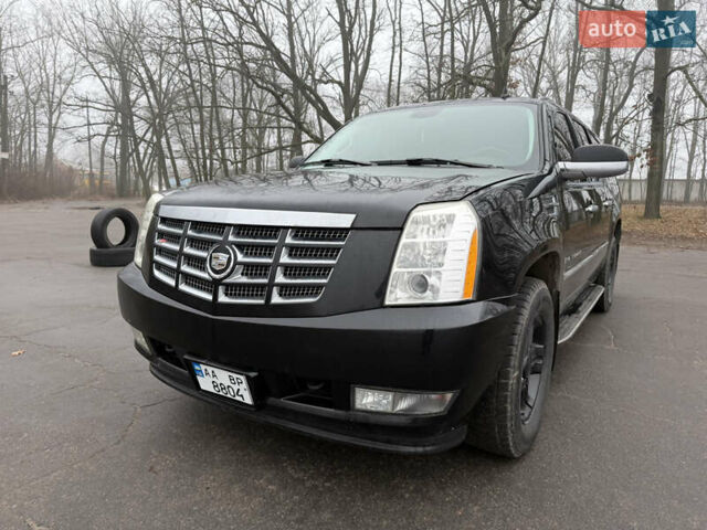 Чорний Каділак Ескалейд, об'ємом двигуна 6.2 л та пробігом 250 тис. км за 14000 $, фото 1 на Automoto.ua