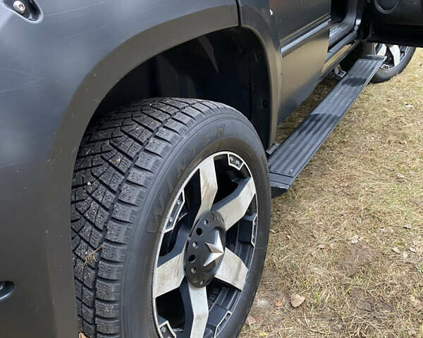 Чорний Каділак Ескалейд, об'ємом двигуна 6.2 л та пробігом 180 тис. км за 12000 $, фото 51 на Automoto.ua