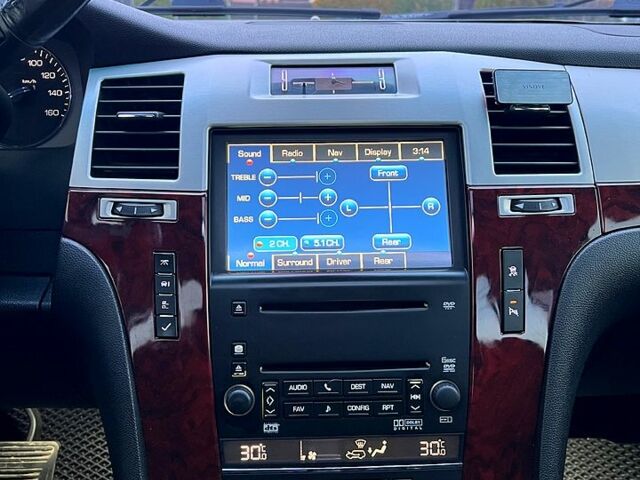 Чорний Каділак Ескалейд, об'ємом двигуна 6.2 л та пробігом 156 тис. км за 15000 $, фото 9 на Automoto.ua