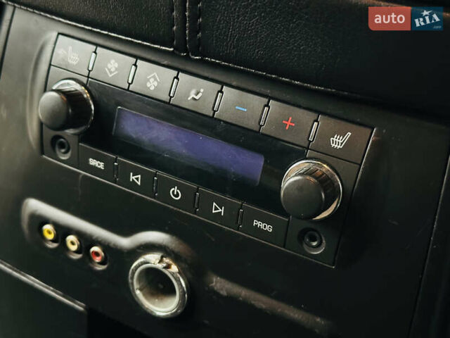 Черный Кадиллак Эскалейд, объемом двигателя 6.16 л и пробегом 255 тыс. км за 14900 $, фото 18 на Automoto.ua