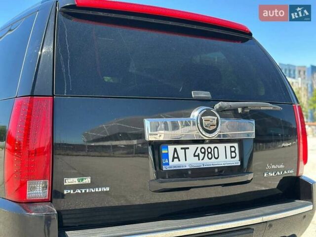 Чорний Каділак Ескалейд, об'ємом двигуна 6.16 л та пробігом 150 тис. км за 26999 $, фото 11 на Automoto.ua