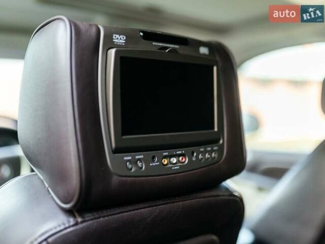 Чорний Каділак Ескалейд, об'ємом двигуна 6.16 л та пробігом 250 тис. км за 26999 $, фото 27 на Automoto.ua