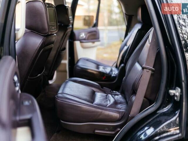 Чорний Каділак Ескалейд, об'ємом двигуна 6.16 л та пробігом 250 тис. км за 26999 $, фото 16 на Automoto.ua