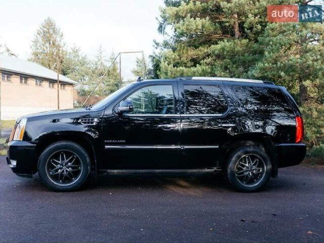 Чорний Каділак Ескалейд, об'ємом двигуна 6.16 л та пробігом 250 тис. км за 26999 $, фото 7 на Automoto.ua