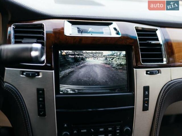 Чорний Каділак Ескалейд, об'ємом двигуна 6.16 л та пробігом 250 тис. км за 26999 $, фото 26 на Automoto.ua