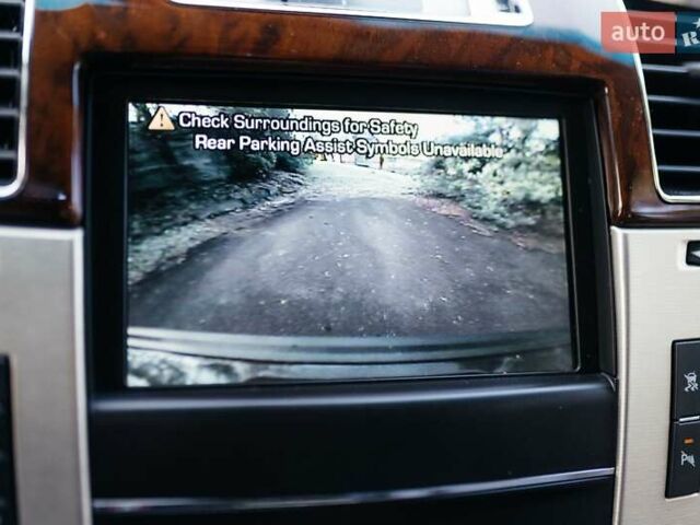 Чорний Каділак Ескалейд, об'ємом двигуна 6.16 л та пробігом 250 тис. км за 26999 $, фото 21 на Automoto.ua