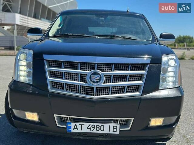 Чорний Каділак Ескалейд, об'ємом двигуна 6.16 л та пробігом 150 тис. км за 26999 $, фото 7 на Automoto.ua
