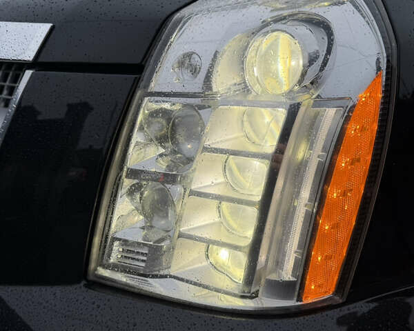 Черный Кадиллак Эскалейд, объемом двигателя 6.18 л и пробегом 231 тыс. км за 29500 $, фото 23 на Automoto.ua