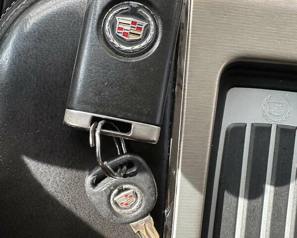 Кадиллак Эскалейд 2013 в Львове на Automoto.ua Черный Кадиллак Эскалейд, объемом двигателя 6.18 л и пробегом 300 тыс. км за 19500 $, фото 32 на Automoto.ua