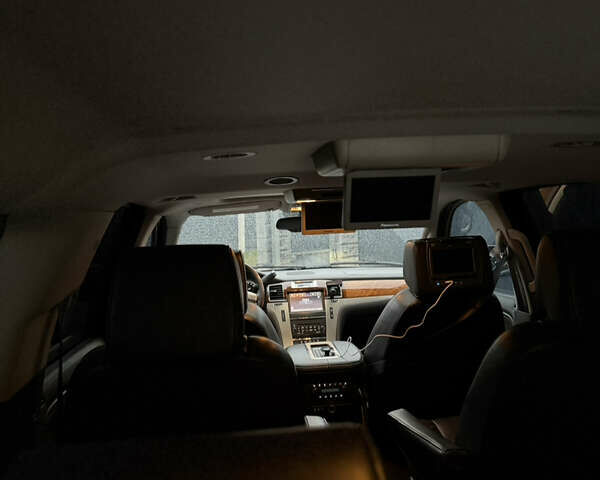 Черный Кадиллак Эскалейд, объемом двигателя 6.18 л и пробегом 231 тыс. км за 29500 $, фото 78 на Automoto.ua