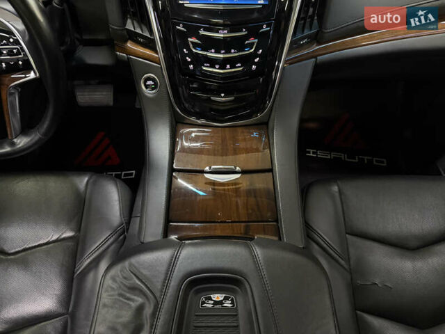 Чорний Каділак Ескалейд, об'ємом двигуна 6.16 л та пробігом 183 тис. км за 33900 $, фото 27 на Automoto.ua