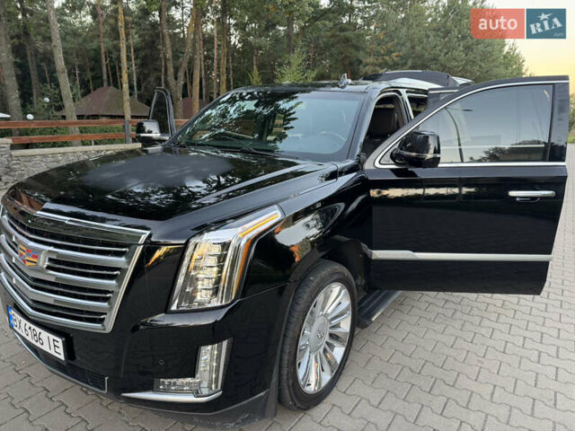 Чорний Каділак Ескалейд, об'ємом двигуна 6.2 л та пробігом 105 тис. км за 40000 $, фото 10 на Automoto.ua