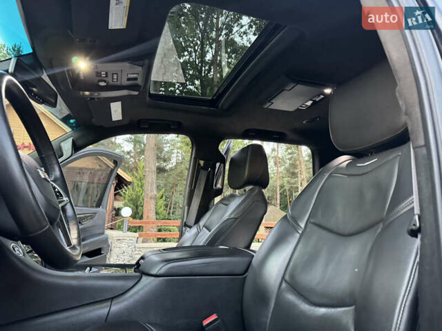 Чорний Каділак Ескалейд, об'ємом двигуна 6.2 л та пробігом 105 тис. км за 40000 $, фото 4 на Automoto.ua