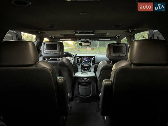 Чорний Каділак Ескалейд, об'ємом двигуна 6.2 л та пробігом 105 тис. км за 40000 $, фото 21 на Automoto.ua