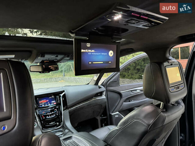 Чорний Каділак Ескалейд, об'ємом двигуна 6.2 л та пробігом 105 тис. км за 40000 $, фото 3 на Automoto.ua