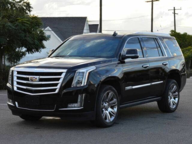 Чорний Каділак Ескалейд, об'ємом двигуна 6.2 л та пробігом 59 тис. км за 5600 $, фото 2 на Automoto.ua