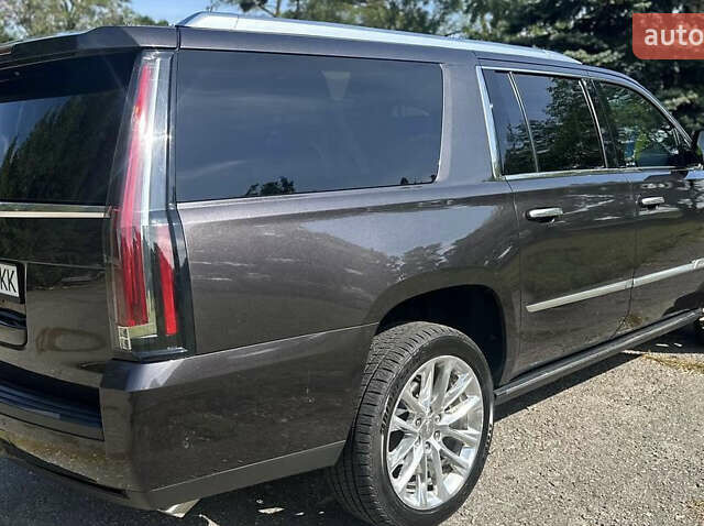 Чорний Каділак Ескалейд, об'ємом двигуна 6.16 л та пробігом 75 тис. км за 47000 $, фото 3 на Automoto.ua