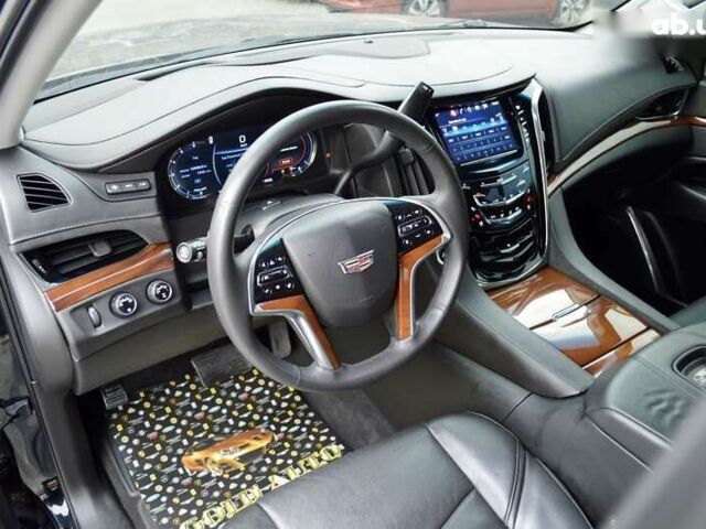 Каділак Ескалейд, об'ємом двигуна 6.2 л та пробігом 165 тис. км за 37500 $, фото 29 на Automoto.ua