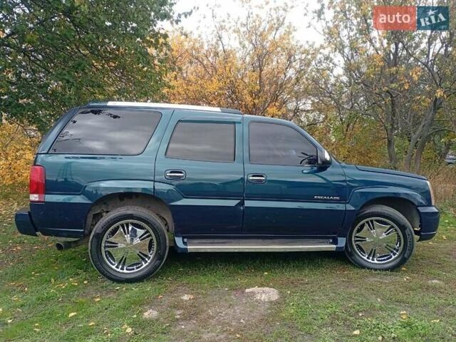Зелений Каділак Ескалейд, об'ємом двигуна 6 л та пробігом 160 тис. км за 15000 $, фото 7 на Automoto.ua