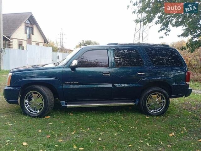 Зелений Каділак Ескалейд, об'ємом двигуна 6 л та пробігом 160 тис. км за 15000 $, фото 4 на Automoto.ua