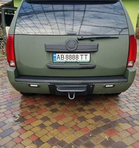 Зеленый Кадиллак Эскалейд, объемом двигателя 6.2 л и пробегом 252 тыс. км за 15000 $, фото 13 на Automoto.ua