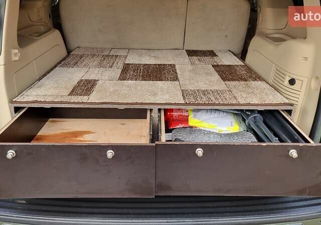 Зеленый Кадиллак Эскалейд, объемом двигателя 6.2 л и пробегом 252 тыс. км за 15000 $, фото 16 на Automoto.ua