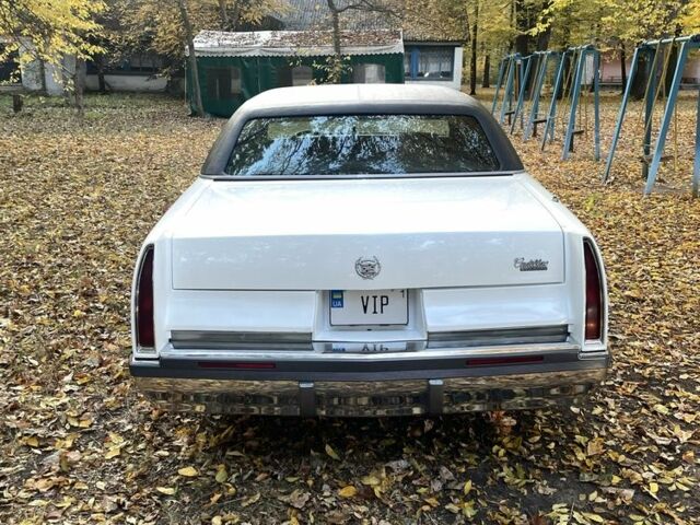 Білий Каділак Флітвуд, об'ємом двигуна 5.7 л та пробігом 100 тис. км за 12000 $, фото 5 на Automoto.ua