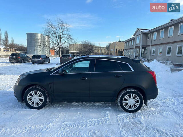 Черный Кадиллак СРХ, объемом двигателя 3.56 л и пробегом 250 тыс. км за 9750 $, фото 2 на Automoto.ua