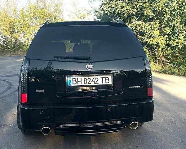 Черный Кадиллак СРХ, объемом двигателя 4.57 л и пробегом 240 тыс. км за 7900 $, фото 5 на Automoto.ua