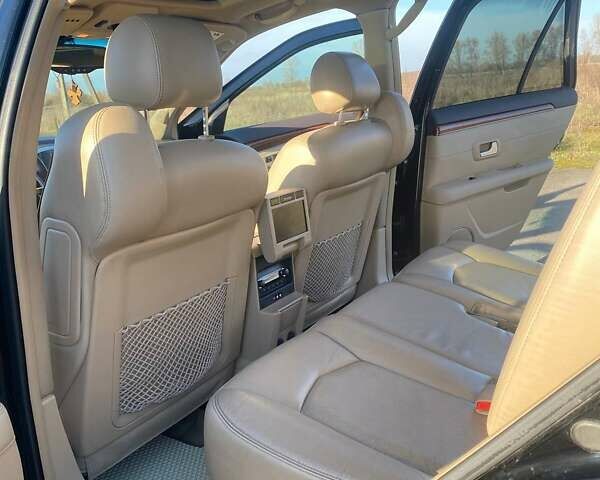 Черный Кадиллак СРХ, объемом двигателя 4.6 л и пробегом 320 тыс. км за 8000 $, фото 9 на Automoto.ua