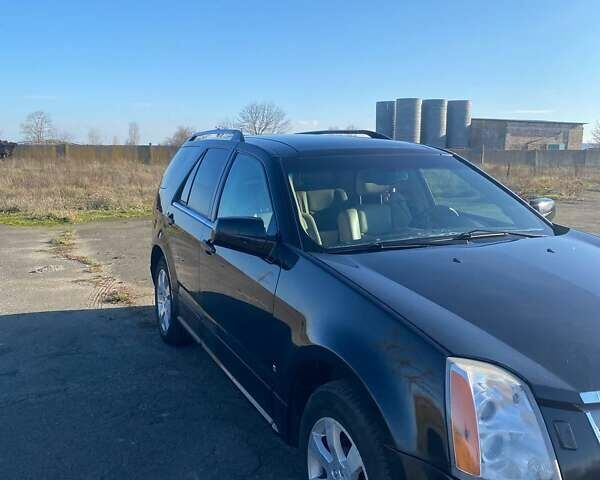 Черный Кадиллак СРХ, объемом двигателя 4.6 л и пробегом 320 тыс. км за 8000 $, фото 1 на Automoto.ua