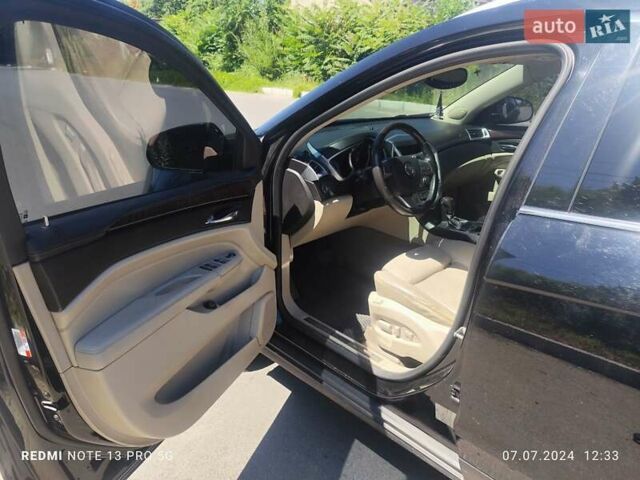 Черный Кадиллак СРХ, объемом двигателя 2.99 л и пробегом 260 тыс. км за 10000 $, фото 6 на Automoto.ua