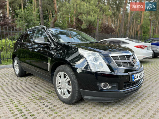 Черный Кадиллак СРХ, объемом двигателя 3 л и пробегом 145 тыс. км за 10500 $, фото 5 на Automoto.ua