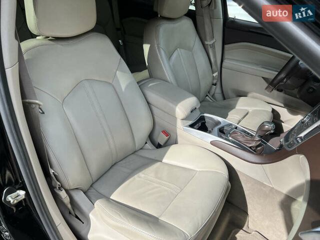 Черный Кадиллак СРХ, объемом двигателя 3 л и пробегом 145 тыс. км за 10500 $, фото 22 на Automoto.ua
