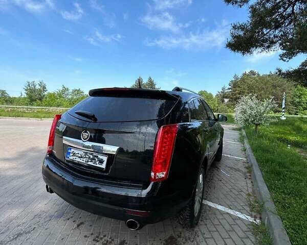 Чорний Каділак SRX, об'ємом двигуна 3 л та пробігом 202 тис. км за 15300 $, фото 3 на Automoto.ua