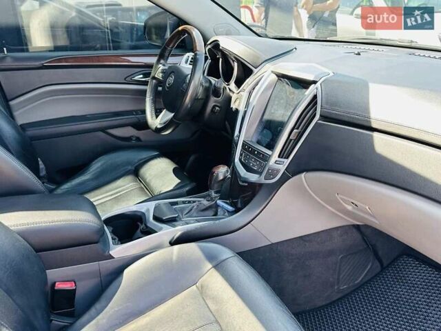 Черный Кадиллак СРХ, объемом двигателя 3 л и пробегом 146 тыс. км за 12200 $, фото 47 на Automoto.ua