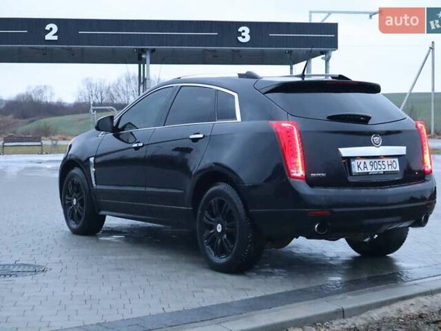 Чорний Каділак SRX, об'ємом двигуна 2.99 л та пробігом 256 тис. км за 8500 $, фото 2 на Automoto.ua