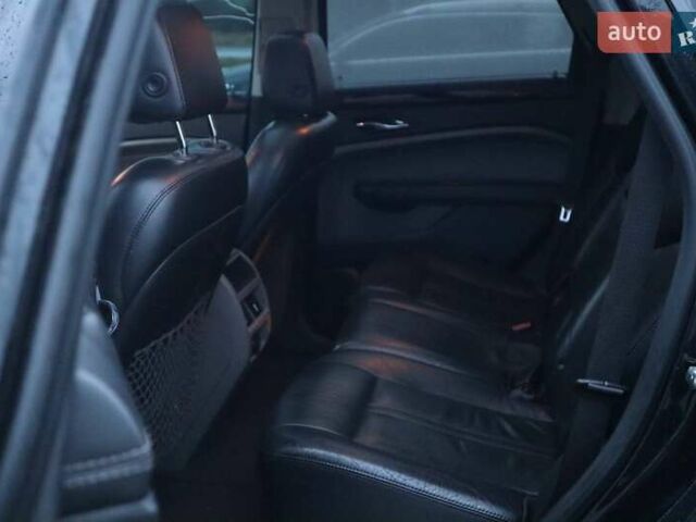Чорний Каділак SRX, об'ємом двигуна 2.99 л та пробігом 256 тис. км за 8500 $, фото 7 на Automoto.ua