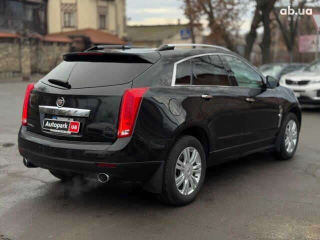 Чорний Каділак SRX, об'ємом двигуна 3 л та пробігом 195 тис. км за 10790 $, фото 13 на Automoto.ua