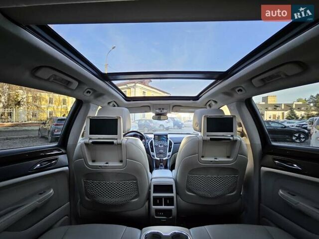 Чорний Каділак SRX, об'ємом двигуна 2.99 л та пробігом 209 тис. км за 11900 $, фото 8 на Automoto.ua