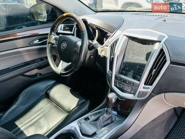 Черный Кадиллак СРХ, объемом двигателя 3 л и пробегом 146 тыс. км за 12200 $, фото 48 на Automoto.ua