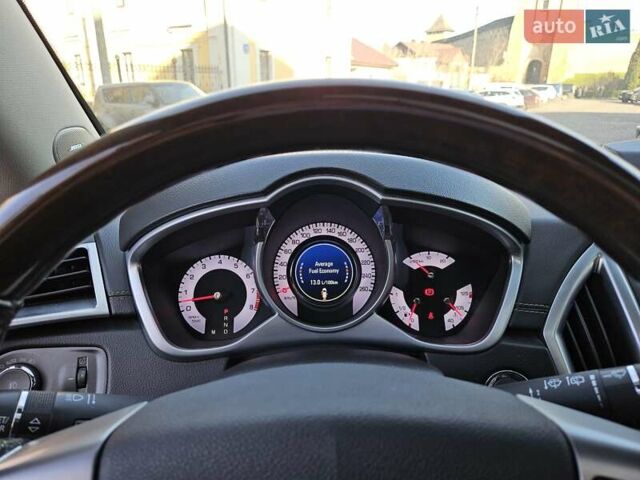 Чорний Каділак SRX, об'ємом двигуна 2.99 л та пробігом 209 тис. км за 11900 $, фото 13 на Automoto.ua
