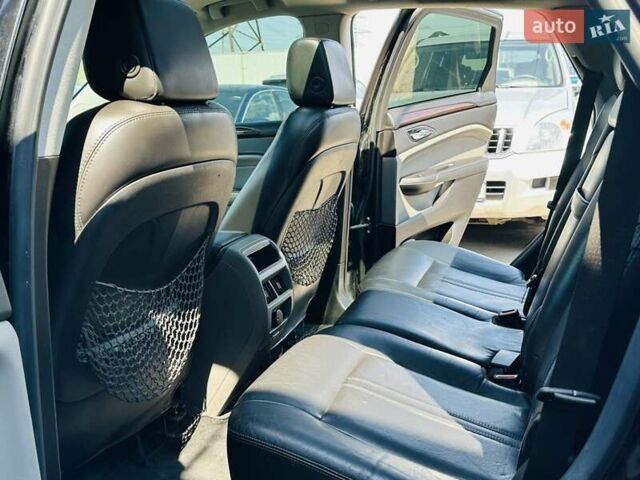 Черный Кадиллак СРХ, объемом двигателя 3 л и пробегом 146 тыс. км за 12200 $, фото 32 на Automoto.ua