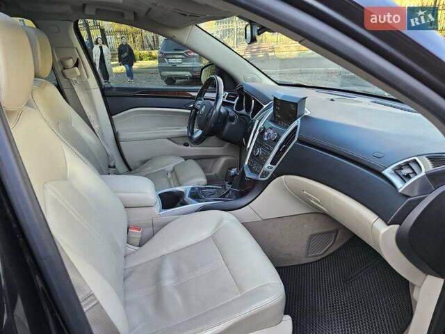 Чорний Каділак SRX, об'ємом двигуна 2.99 л та пробігом 209 тис. км за 11900 $, фото 7 на Automoto.ua