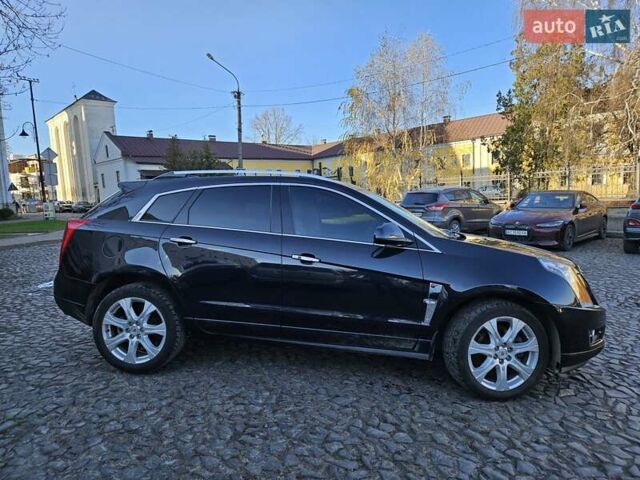 Чорний Каділак SRX, об'ємом двигуна 2.99 л та пробігом 209 тис. км за 11900 $, фото 4 на Automoto.ua