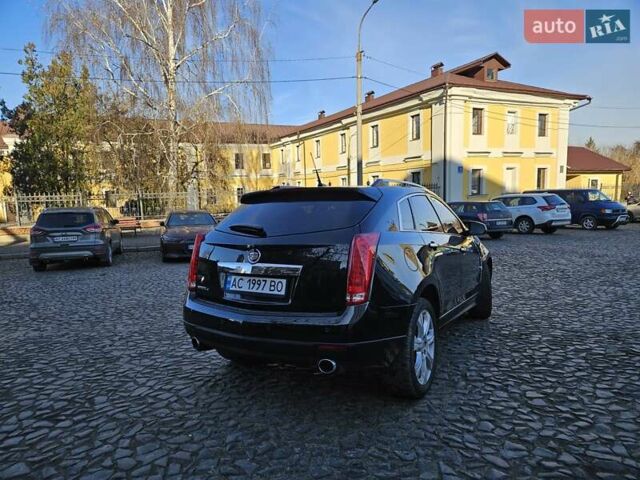 Чорний Каділак SRX, об'ємом двигуна 2.99 л та пробігом 209 тис. км за 11900 $, фото 3 на Automoto.ua
