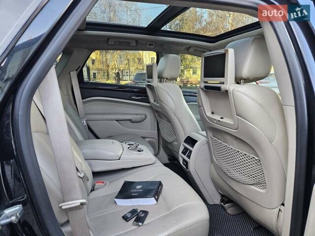 Чорний Каділак SRX, об'ємом двигуна 2.99 л та пробігом 209 тис. км за 11900 $, фото 9 на Automoto.ua