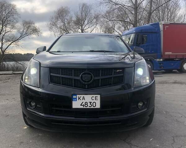 Чорний Каділак SRX, об'ємом двигуна 3 л та пробігом 390 тис. км за 9200 $, фото 2 на Automoto.ua