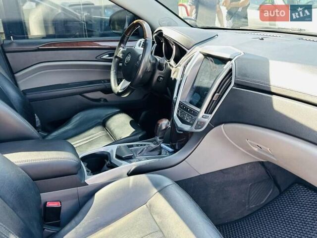 Черный Кадиллак СРХ, объемом двигателя 3 л и пробегом 146 тыс. км за 12200 $, фото 46 на Automoto.ua
