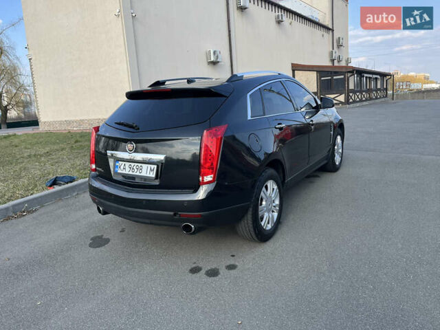 Черный Кадиллак СРХ, объемом двигателя 3 л и пробегом 300 тыс. км за 9000 $, фото 3 на Automoto.ua